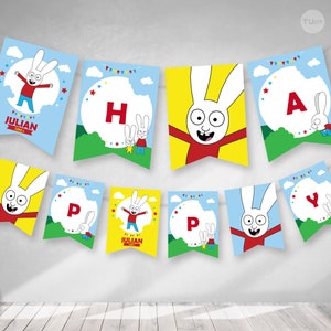 Pu&ograve; includere: Uno striscione di buon compleanno colorato con un personaggio di coniglio bianco con accenti rossi e gialli. Lo striscione include le lettere H, A, P, P, Y e il nome Julian.