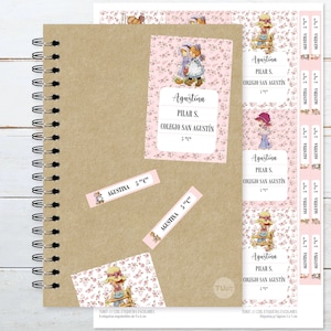 May include: A set of printable school labels featuring a pink floral design with a girl in a straw hat. The labels include the name "Agustina", "Pilar S.", "Colegio San Agustin", and "5" in inches.