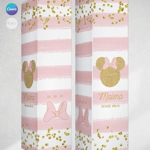 Könnte beinhalten: Zwei dekorative Boxen mit rosa und weißen Streifen, goldenen Glitzerakzenten und einer Minnie-Mouse-Silhouette. Auf den Boxen stehen der Name "Malena" und der Text "PRIMER AÑITO".