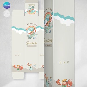 May include: A light grey gift box featuring illustrations of a boy in a plane, a fox, and a rainbow. The box has the text "Gracias por venir" and "Bautista" with the date "23.10.27". The design includes clouds and a banner.