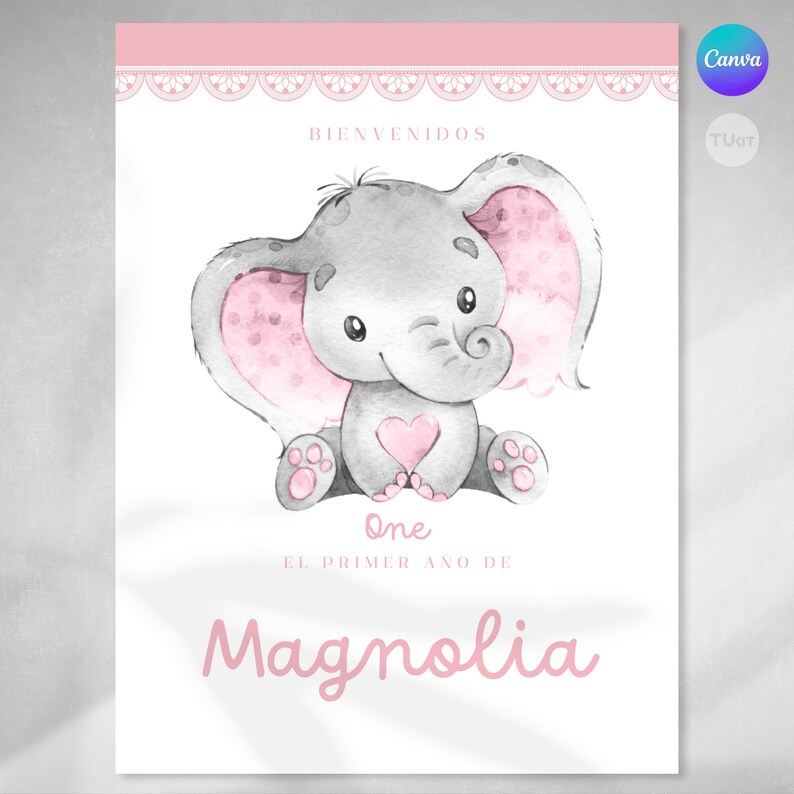 May include: A pink and gray watercolor illustration of an elephant holding a pink heart. The text "BIENVENIDOS" is at the top of the image, and the text "one EL PRIMER A&Ntilde;O DE Magnolia" is at the bottom of the image.