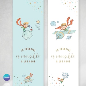 Puede incluir: Dos marcapáginas con ilustraciones de "El Principito". Uno es celeste, el otro blanco. Cada uno presenta un príncipe de dibujos animados, planetas y el texto "LO ESENCIAL es invisible A LOS OJOS."