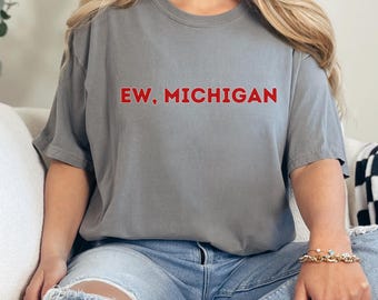 May include: A gray t-shirt with the text "EW, MICHIGAN" printed in red on the front.