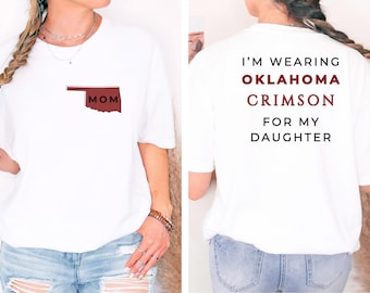 Ich trage Oklahoma Rot für meine Tochter, das Oklahoma Universitäts-T-Shirt, das Softball-Shirt, das Fussball-Shirt oder die Mutter