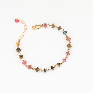 The bracelet has a lobster claw clasp, & 1.5 inch extension chain.