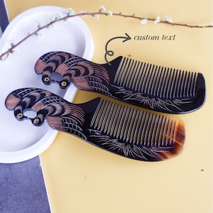 May include: Two decorative combs with detailed bird designs. The combs are black with brown and gold accents, and feature fine teeth for grooming. The handles are carved with detailed bird motifs, adding a touch of elegance to the hair accessories.