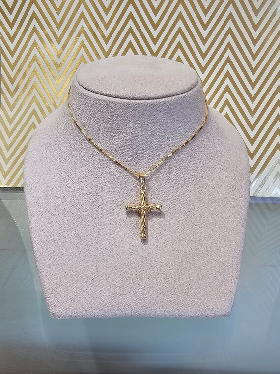 Circa 1980, a 18k yellow gold cross pendant. - image 9