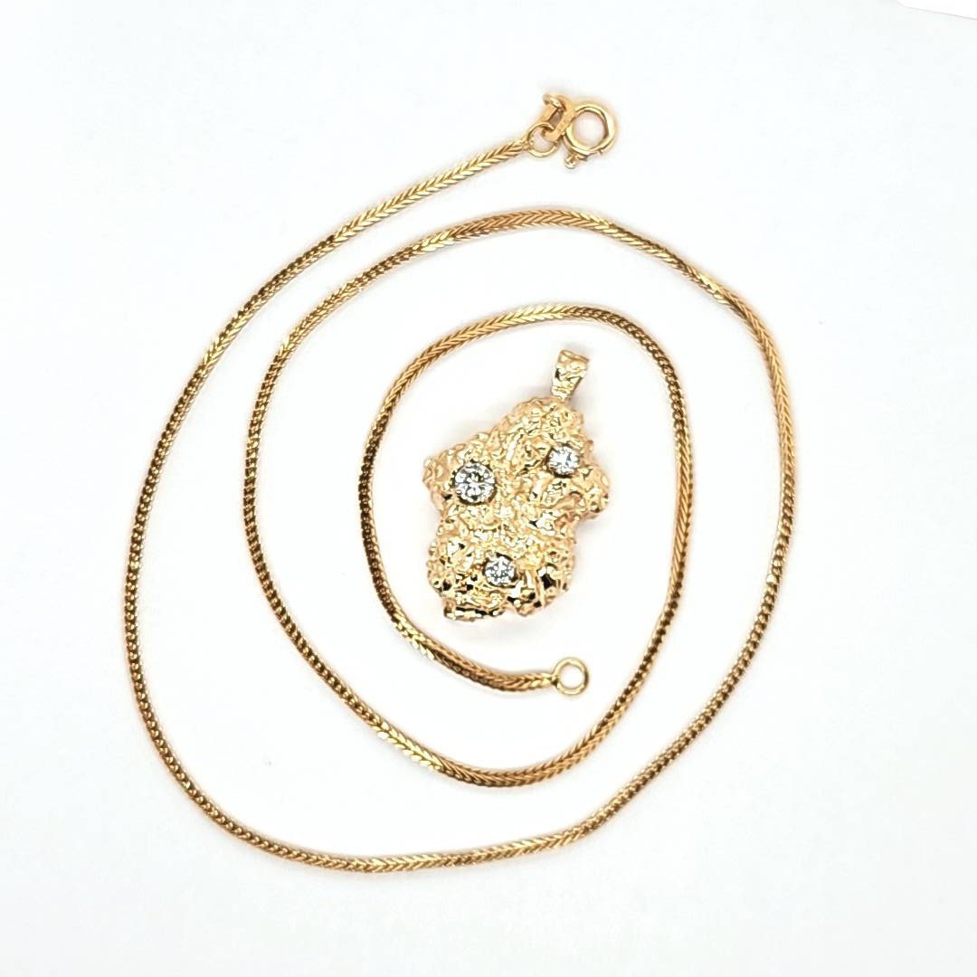 Circa 1975, a 14k Yellow Gold Manufactured Gold Nugget Circa 1975, a 14k Yellow Gold Manufactured Gold Nugget