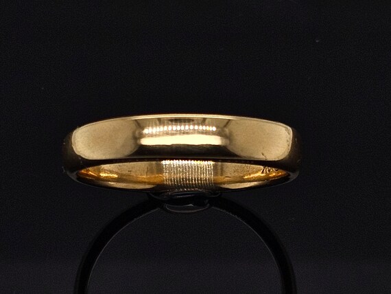 Circa 1970, a 4.6mm wide 18k yellow gold comfort-… - image 7