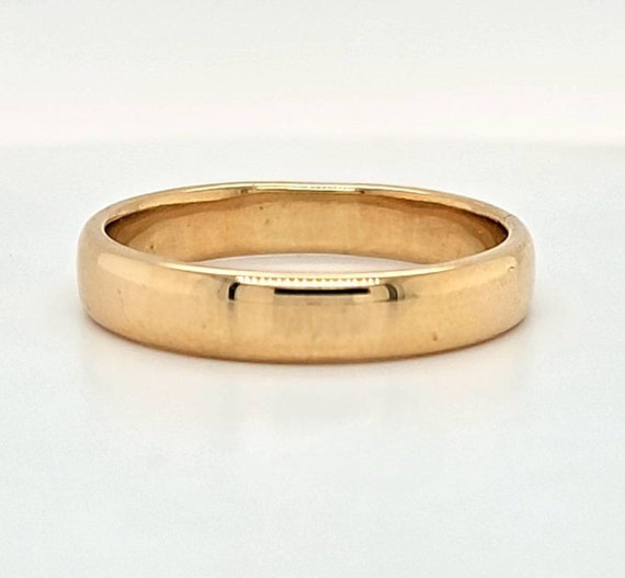 Circa 1970, a 4.6mm wide 18k yellow gold comfort-… - image 3