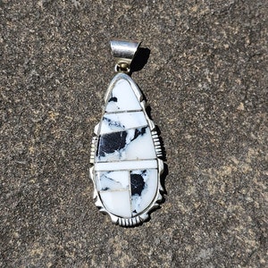 White Buffalo & Sterling Silver Intarsia Design Pendant.