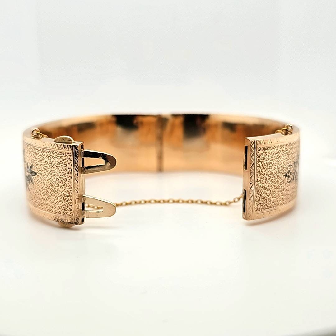 Circa 1900, a 20mm Wide 14k Yellow Gold, Flat Hinged Bangle Circa 1900, a 20mm Wide 14k Yellow Gold, Flat Hinged Bangle