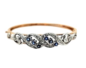 14k Yellow Gold & White Gold, Sapphire hinged bangle bracelet.