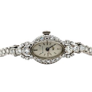 Vintage 14k white gold & diamond Bulova ladie's mechanical wristwatch. 6.25" length image 5