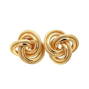 Pendientes de nudo texturizado en oro amarillo de 14 k.