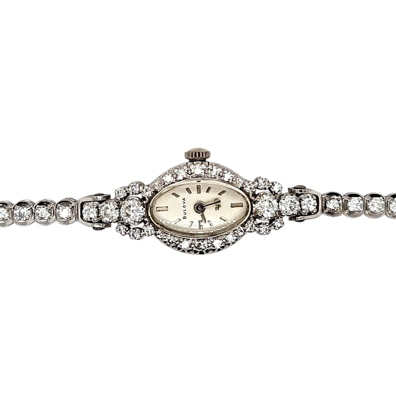 Vintage 14k white gold & diamond Bulova ladie's mechanical wristwatch. 6.25" length image 10
