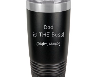 May include: Black stainless steel tumbler with a silver lid. The tumbler has an engraved message that reads "Dad is THE Boss! (Right, Mom?)"
