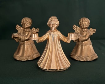 Set of cherub candle holder made of brass, vintage