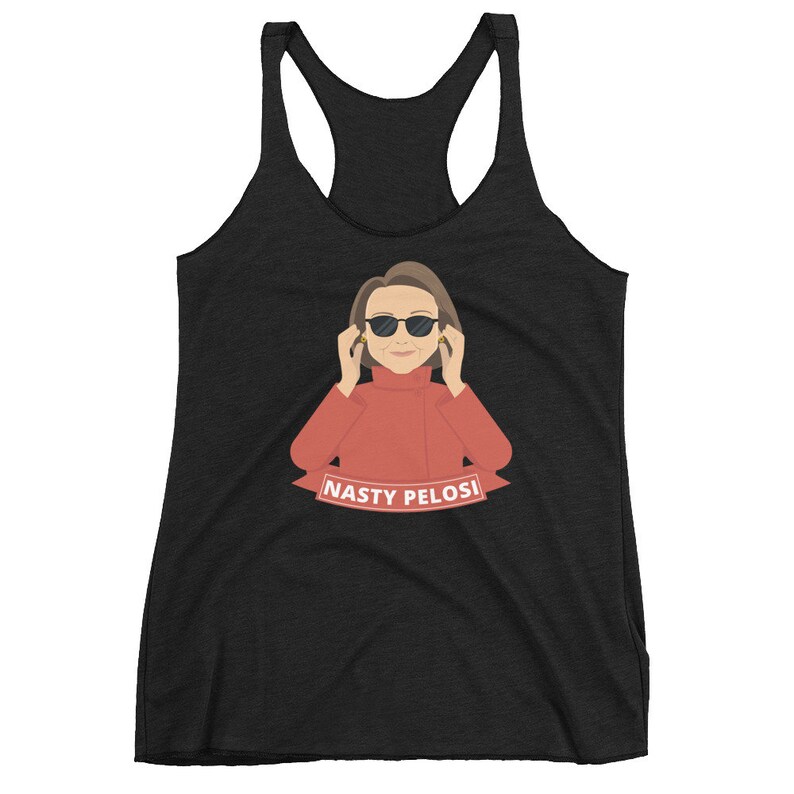 May include: Black tank top with a cartoon illustration of a woman wearing sunglasses and a red sweater. The text "Nasty Pelosi!" is printed on a red banner below the illustration.
