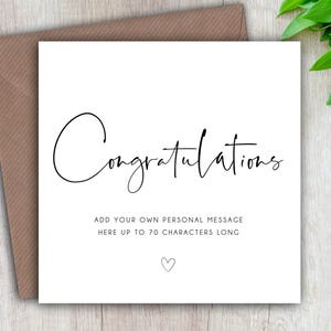 May include: A white greeting card with the word "Congratulations" in elegant black script. The card includes space for a personal message and a small heart symbol. It is paired with a brown envelope.