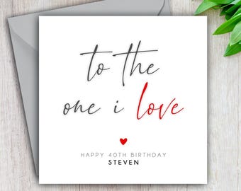 May include: White card with black calligraphy that reads "to the one i love" with a red heart and the text "Happy 40th Birthday Steven".