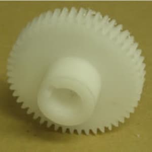 May include: White plastic gear with a central hole and a large number of teeth around the outer edge.