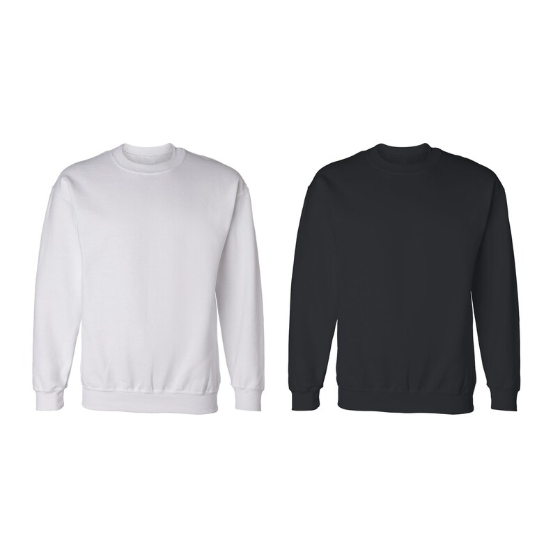 May include: Two crewneck sweatshirts, one white and one black. Both sweatshirts have long sleeves and a relaxed fit.