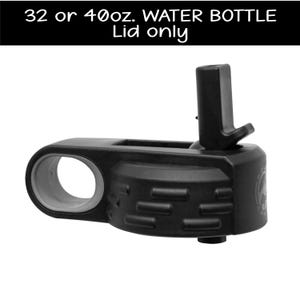 May include: Black plastic water bottle lid with a gray ring around the opening. The lid has a push-button spout and a textured base. 32 or 40oz. WATER BOTTLE Lid only
