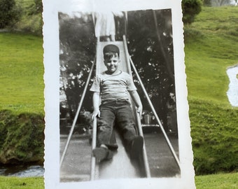 Vintage B&W Photo Boy in Park Playing on Slide Playground