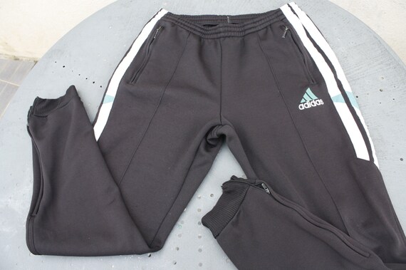 guy in adidas tracksuit