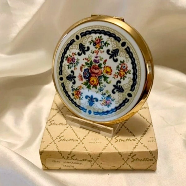 Vintage Stratton compact. Multi colour flower design. Mini convertible powder compact. Very pretty. Boxed. Mint. Made in England