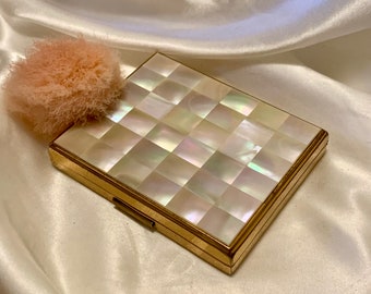 Vintage Agme mother of pearl minaudiere. All in one powder compact, lipstick,false eyelash or cigarette case. 1950s