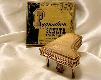 Vintage Pygmalion Sonata Piano shaped loose powder compact in box with original puff, sifter and box 1950s