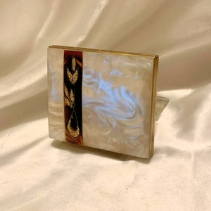 Vintage lucite compact. Faux mother of pearl. Made in Switzeland 1950s