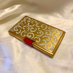 Vintage Yardley compact. Enamel and gilt face powder and rouge compact. Unused Rouge.  Made in England 1960s
