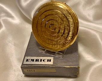 Vintage Emrich gold plated compact. Convertible powder compact for pressed or loose powder. Unused in presentation box.  Mint condition