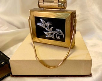 Vintage Kigu party case. Black enamel, Gilt and marcasite  luxury minaudiere. compact, cigarettes and lipstick. 1950s 74 series MINT