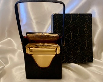 Stratton empress compact and cigarette case. Black silk holdall. Excellent condition. Original box. 1950s.