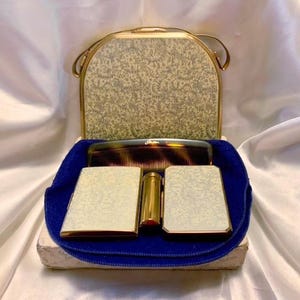 Vintage Stratton party case. Complete. Powder compact, lipstick, comb and cigarette case. Silk lined enamelled purse or minaudiere. 1950s