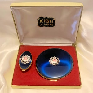 Kigu blue compact set. Convertible powder compact and lipstick mirror. Guilloche rose. 81 series. Unused. 1960s