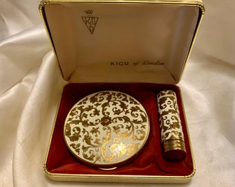 Kigu compact and lipstick case gift set. Cream and gilt florentine pattern. Boxed. Made in England. Vintage. 1950s