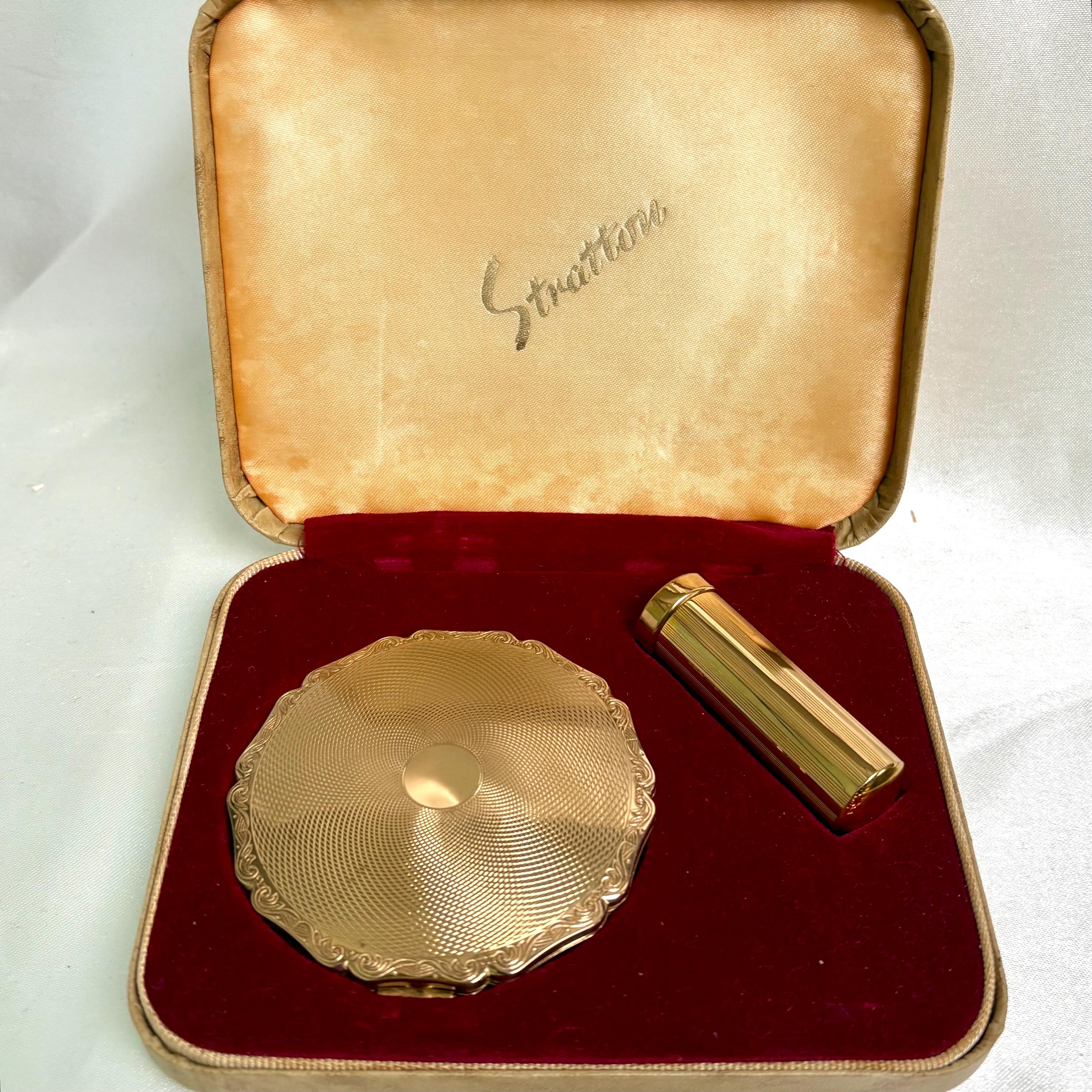 Stratton compact set. Princess powder compact and lipstick case . Engine turned gilt. Unused and original box. Vintage 1950s