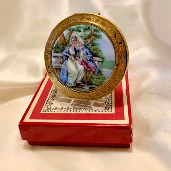 Vintage Regent powder compact painted porcelain and enamel courting couple .Boxed. Made in England 1960s