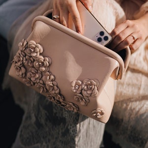 Leather Clutch Bag with Blossom Powder Design image 1