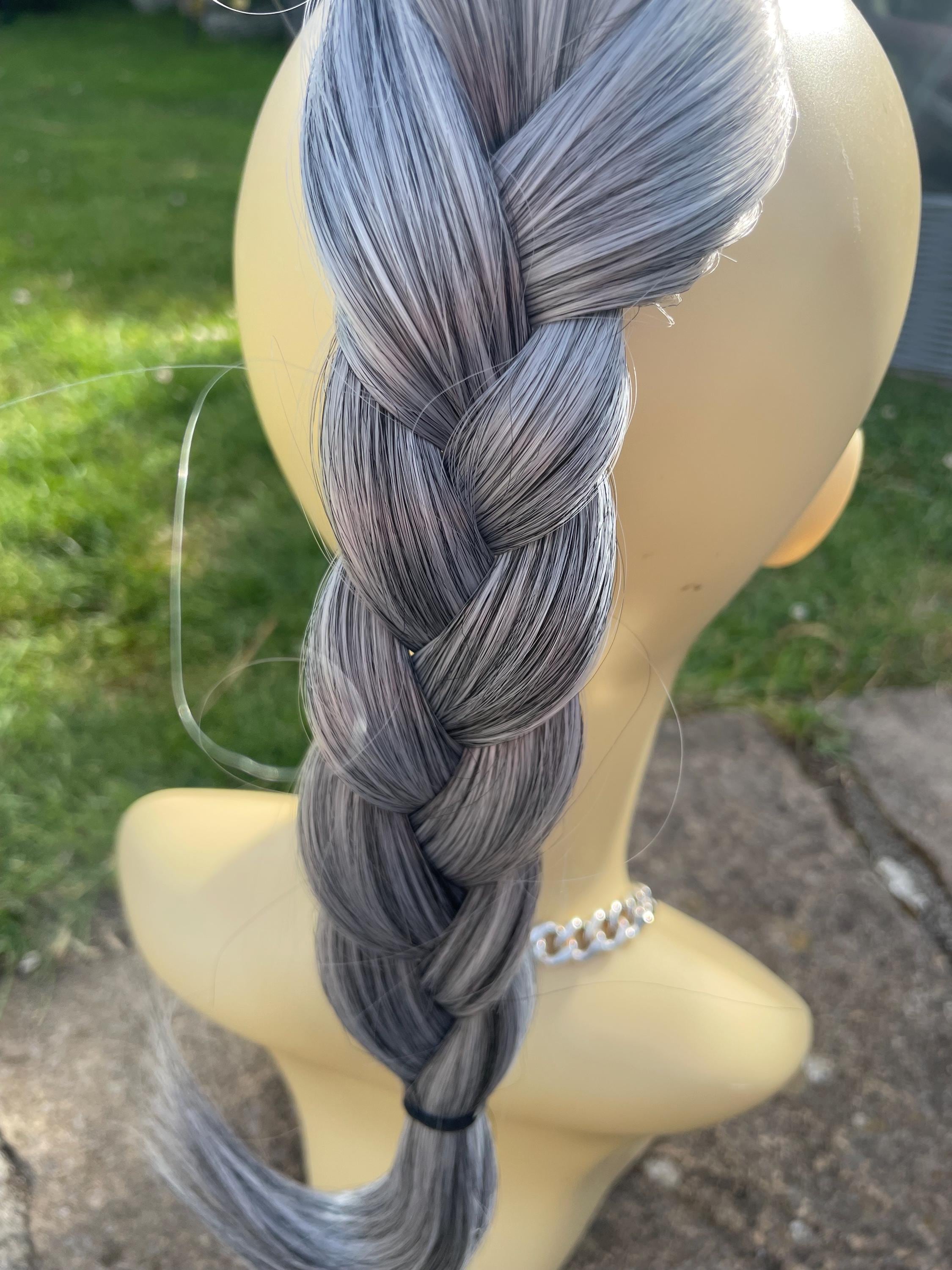 Clip on fishtail braided ponytail extension in salt and pepper , medium length approx 30 cm (14/22)