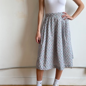Jupe midi évasée bleue abstraite vintage des années 80