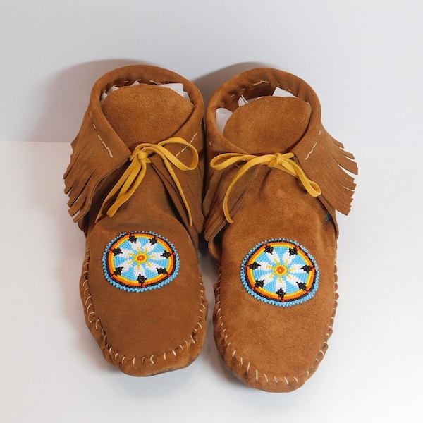 Native American style short boot moccasins with fringe. Handmade with beaded rosette and genuine leather moccasins