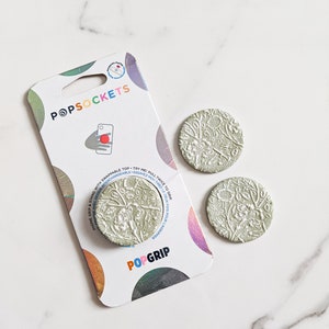 ジェイドアイボリー磁器 本物のPopSocket™ PopGrip電話グリップ 拡張スタンドとグリップ 交換可能なトップ付き 粘土電話グリップ ボヘミアン