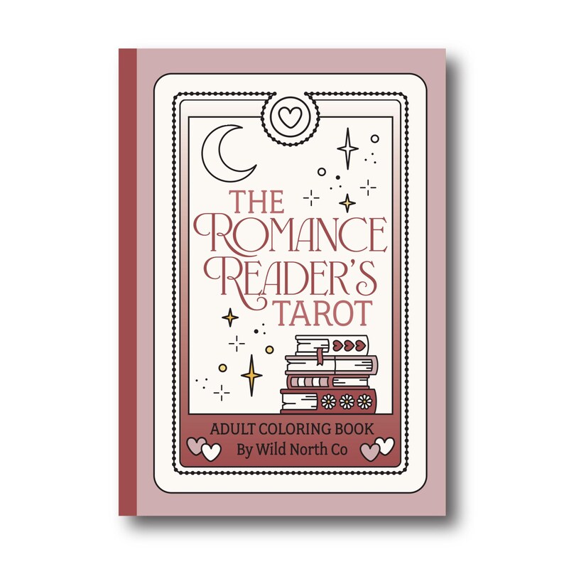 May include: A pink and white coloring book with a tarot card design. The cover features a crescent moon, stars, and a stack of books. The title is "The Romance Reader's Tarot" and the text below reads "Adult Coloring Book by Wild North Co."