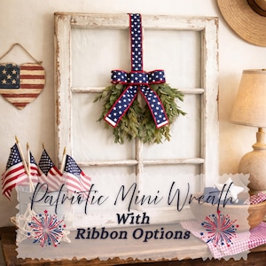 May include: A handmade wooden sign with the text "Welcome" in a whimsical font. The sign is painted white with a distressed finish, and features a decorative floral design in shades of pink and green. It is designed for indoor or outdoor use.